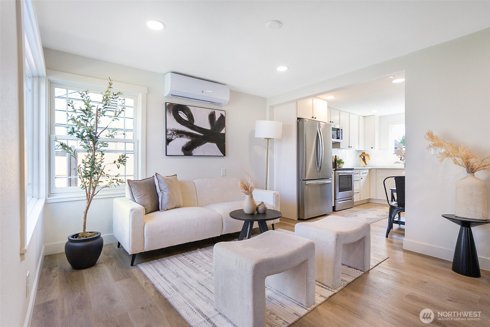 7934 20th Avenue Southwest Seattle, WA 98106 - Photo 3 of 20 a living room with furniture and a large window