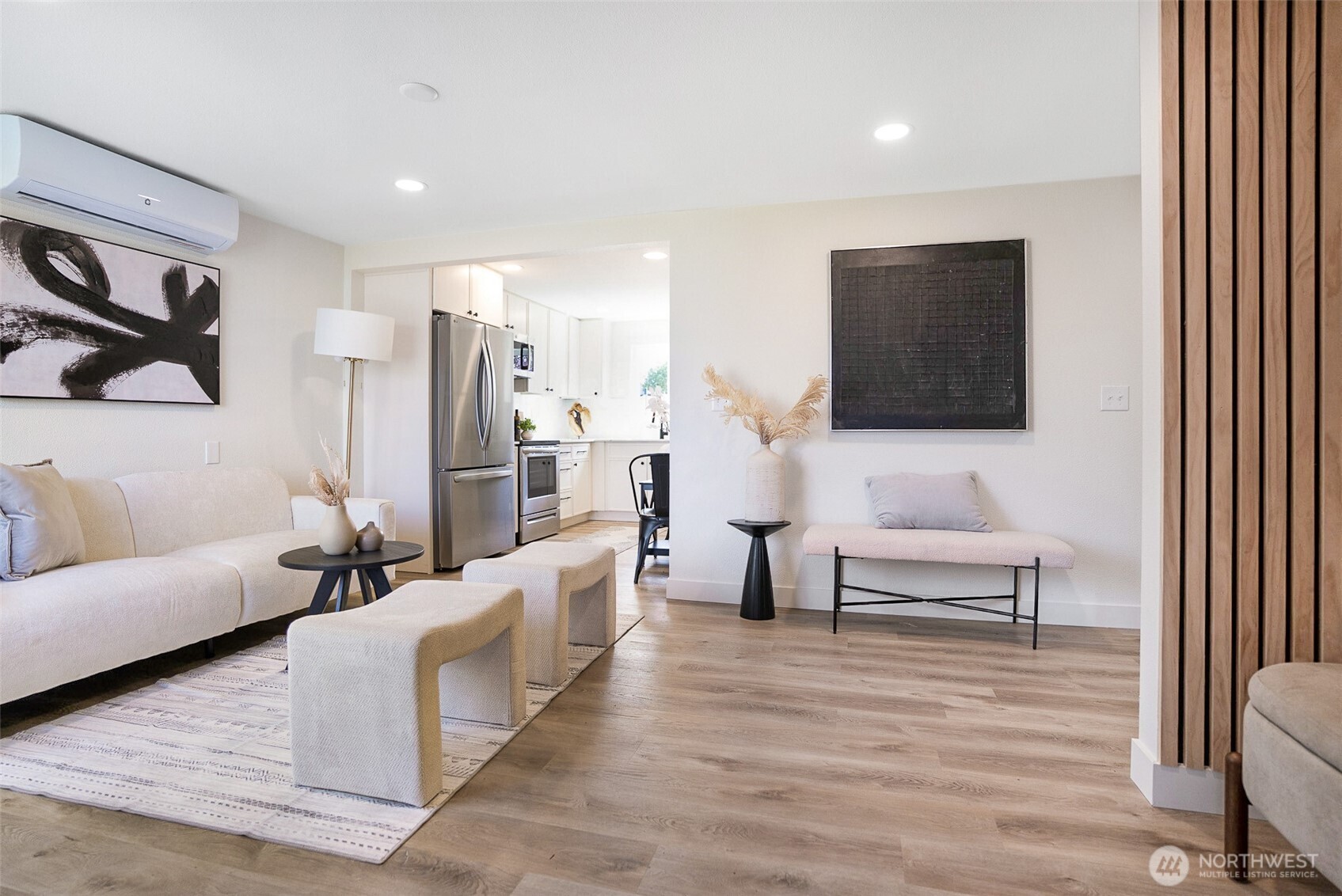 7934 20th Avenue Southwest Seattle, WA 98106 - Photo 5 of 20 a living room with furniture and a wooden floor