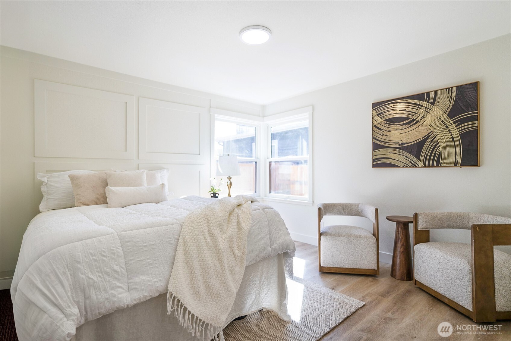 7934 20th Avenue Southwest Seattle, WA 98106 - Photo 9 of 20 a spacious bedroom with a bed and a couch
