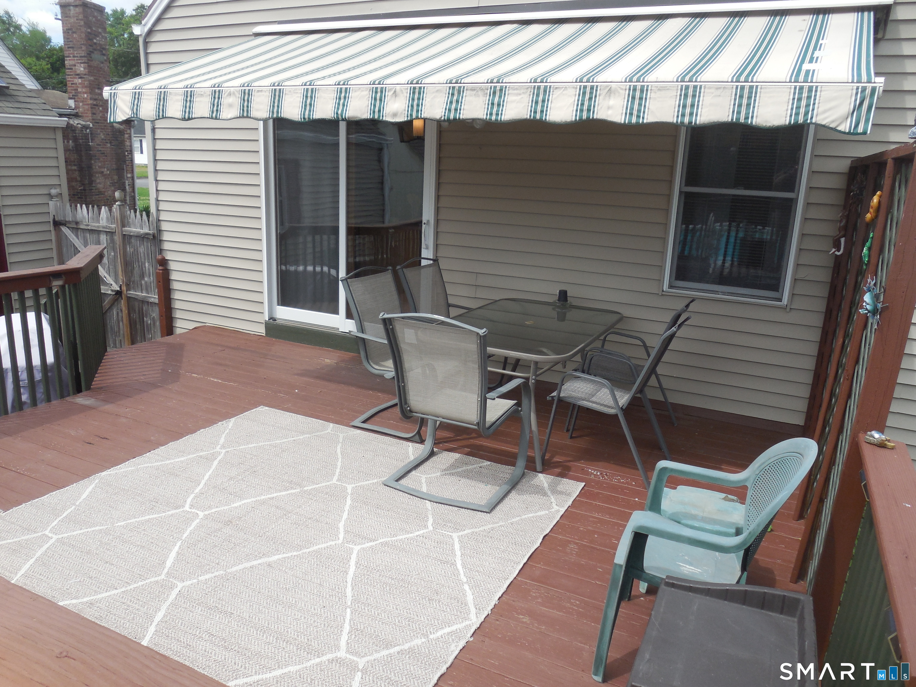 200 Douglas Drive Meriden, CT 06451 - Photo 7 of 24 deck with retractable awning