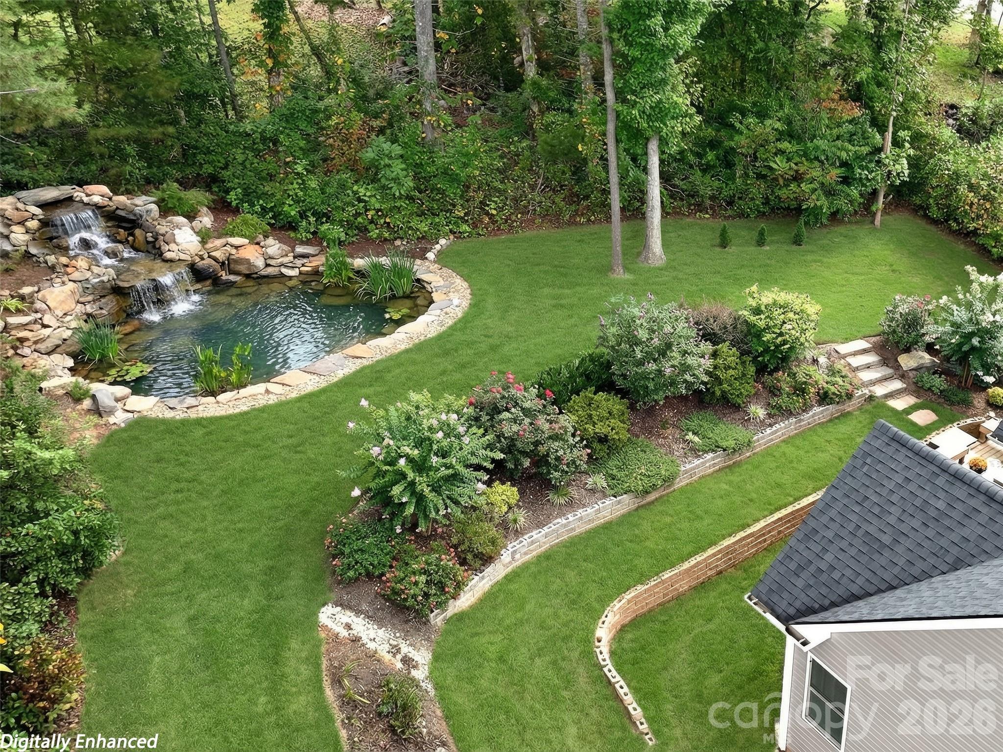 139 Clay Street Fairview, NC 28730 - Photo 33 of 35 a view of a golf course with a lake