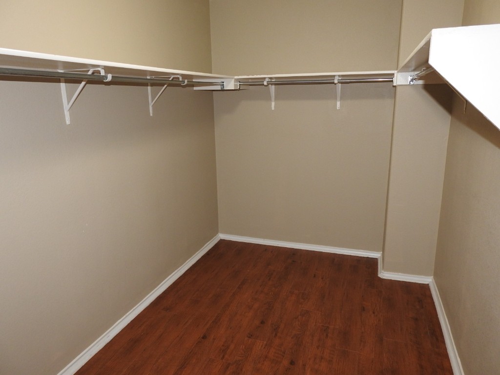 571 New Country Road Kyle, TX 78640 - Photo 13 of 21 a view of an empty walk in closet