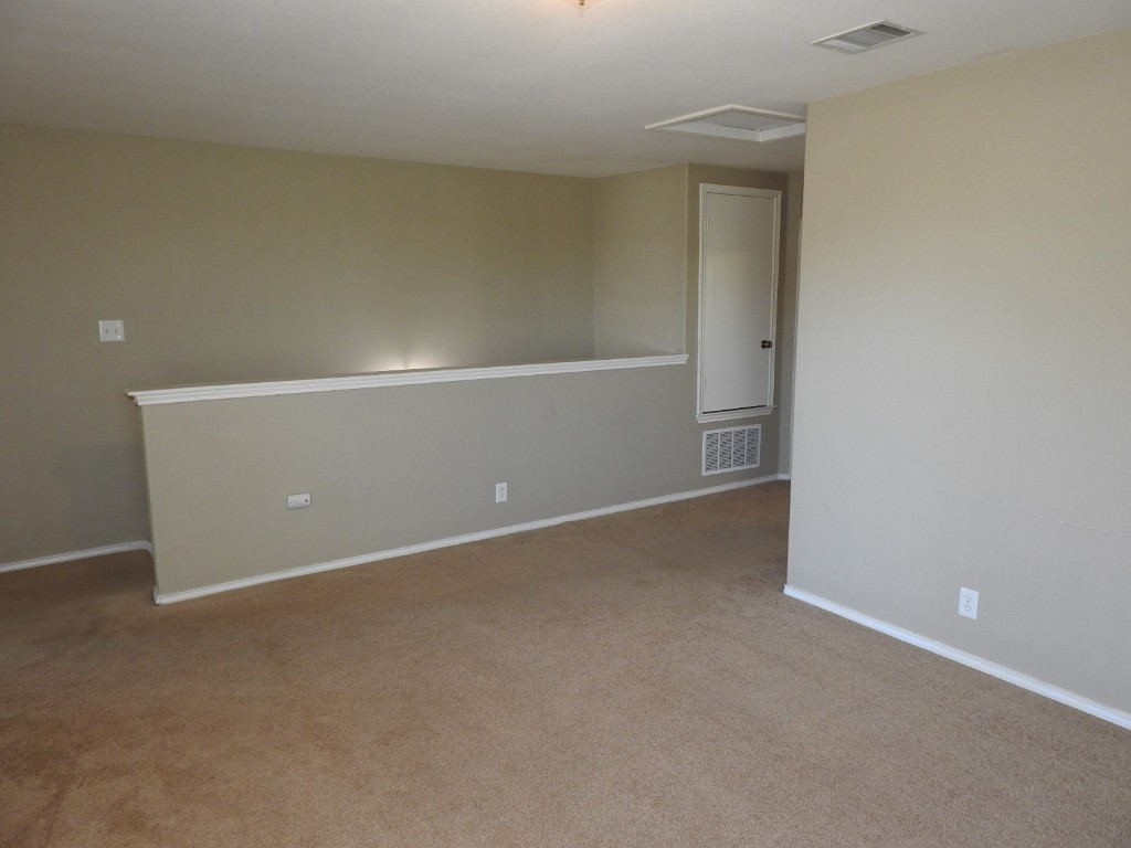 571 New Country Road Kyle, TX 78640 - Photo 14 of 21 a view of an empty room