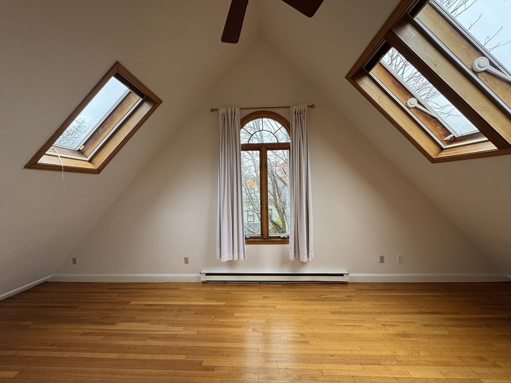 82 Hammond Street, Unit 3 Cambridge, MA 02138 - Photo 12 of 13 a view of a living room and bathroom