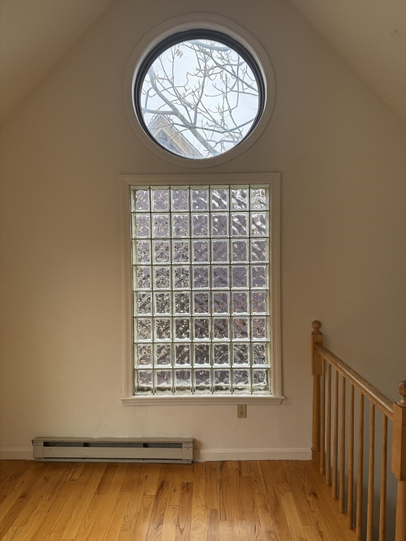 82 Hammond Street, Unit 3 Cambridge, MA 02138 - Photo 6 of 13 an empty room with a window