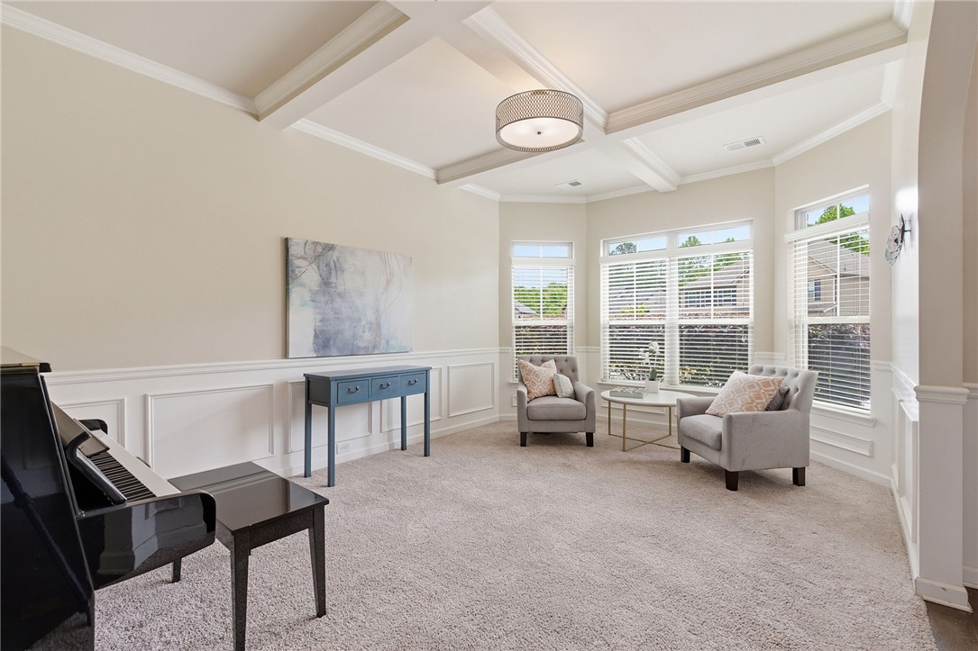 138 Buckland Drive Anderson, SC 29621 - Photo 6 of 49 This bright and airy living space features elegant coffered ceilings and ample natural light.