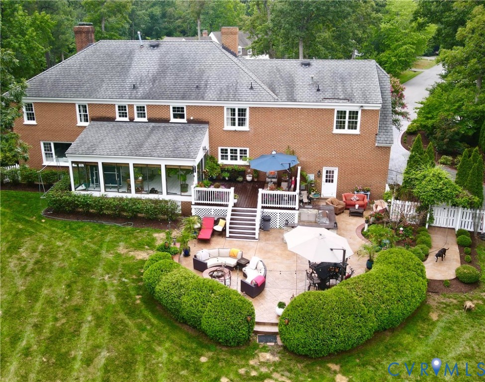 9006 Brieryle Road Henrico, VA 23229 - Photo 4 of 6 Expansive backyard featuring a brick exterior, a m