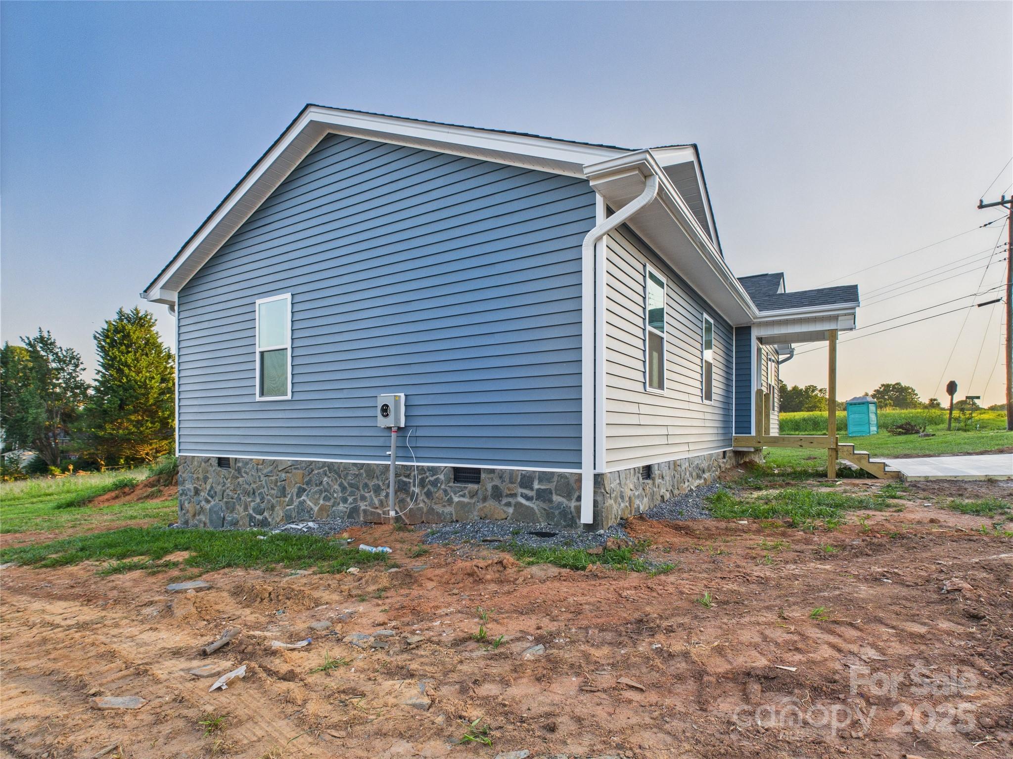 269 Pleasant Hill Road Hudson, NC 28638 - Photo 5 of 10 a front view of a house with garden