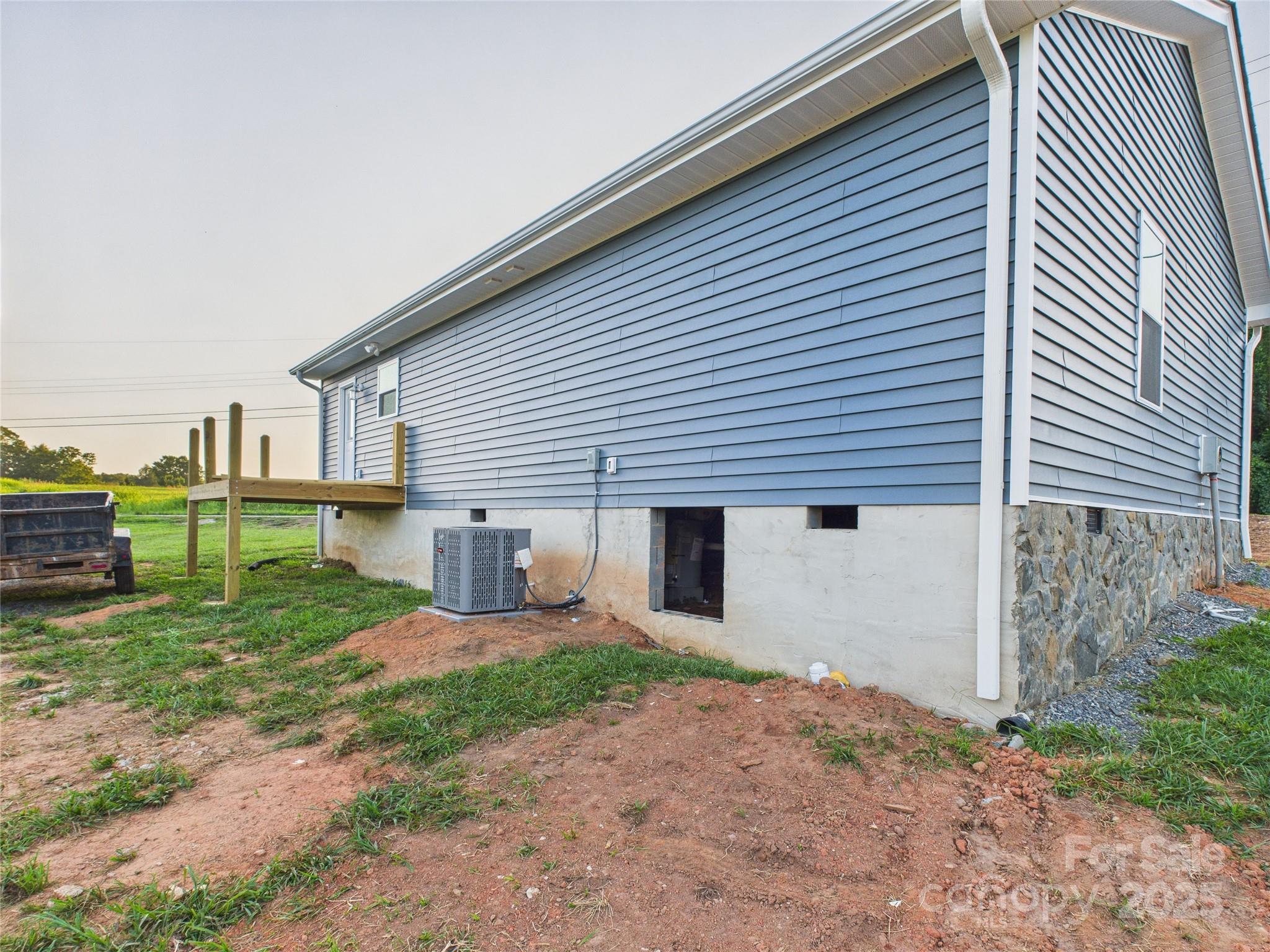 269 Pleasant Hill Road Hudson, NC 28638 - Photo 6 of 10 a view of a house with backyard and porch