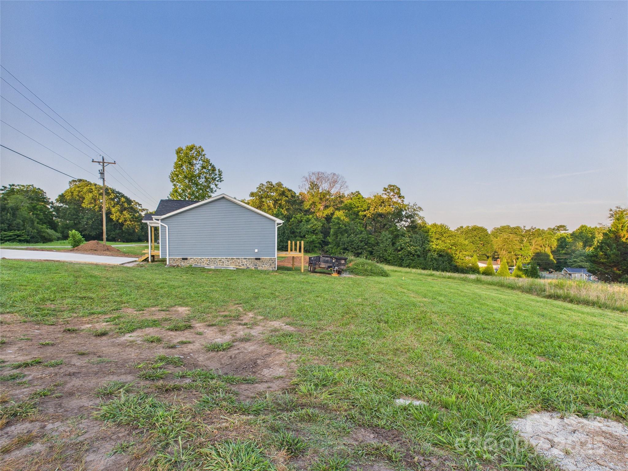 269 Pleasant Hill Road Hudson, NC 28638 - Photo 8 of 10 a view of a house with a yard