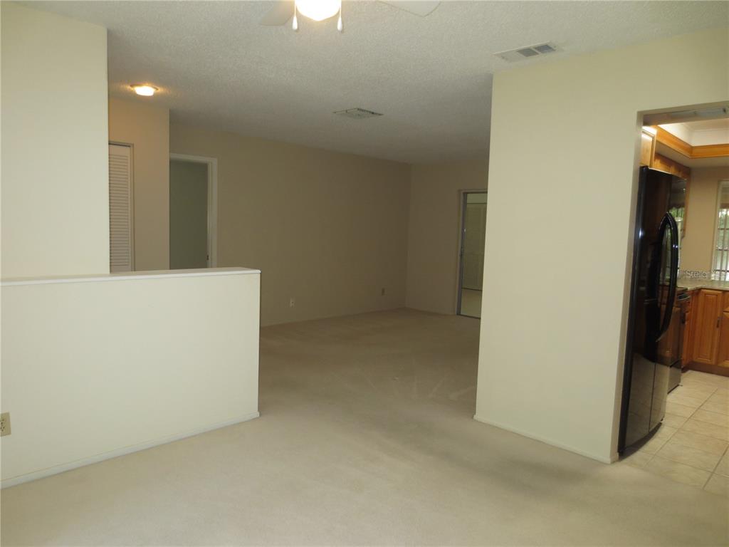 3235 East Dorchester Drive Palm Harbor, FL 34684 - Photo 11 of 47 a view of an empty room