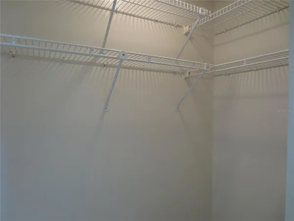 a view of a room with a large window