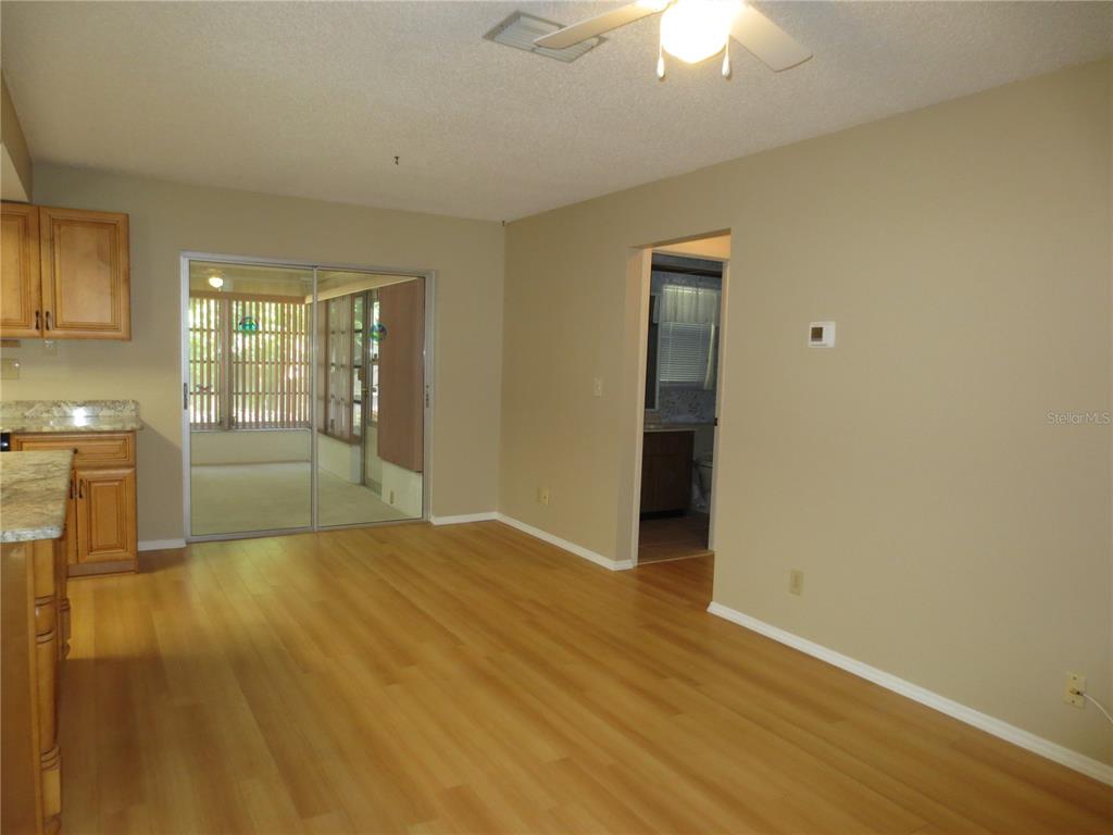 3235 East Dorchester Drive Palm Harbor, FL 34684 - Photo 10 of 47 a view of an empty room with a window