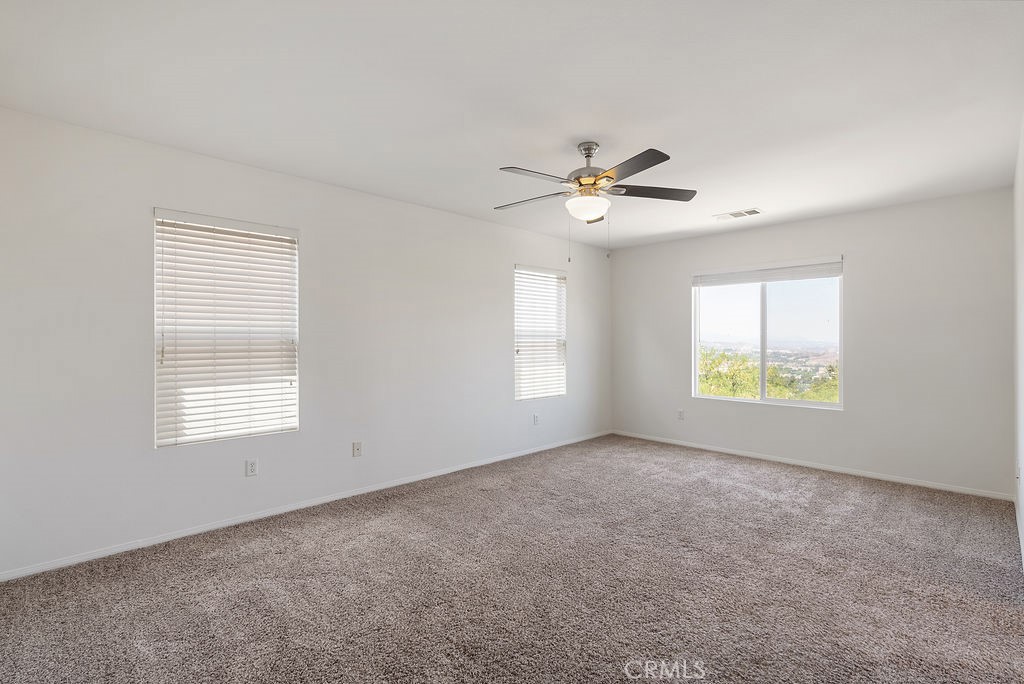 27635 Sienna Rdg Row Canyon Country, CA 91351 - Photo 22 of 30 a view of an empty room with a window