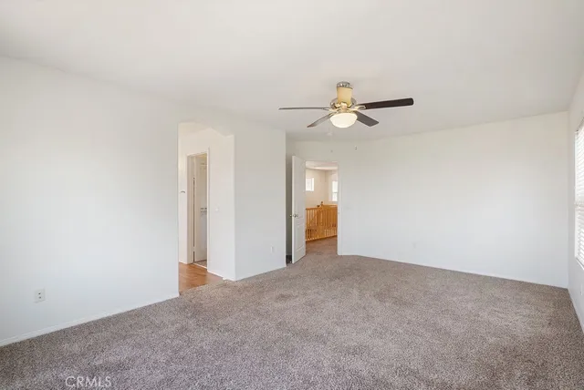 a bathroom with a double vanity sink and mirror with shower