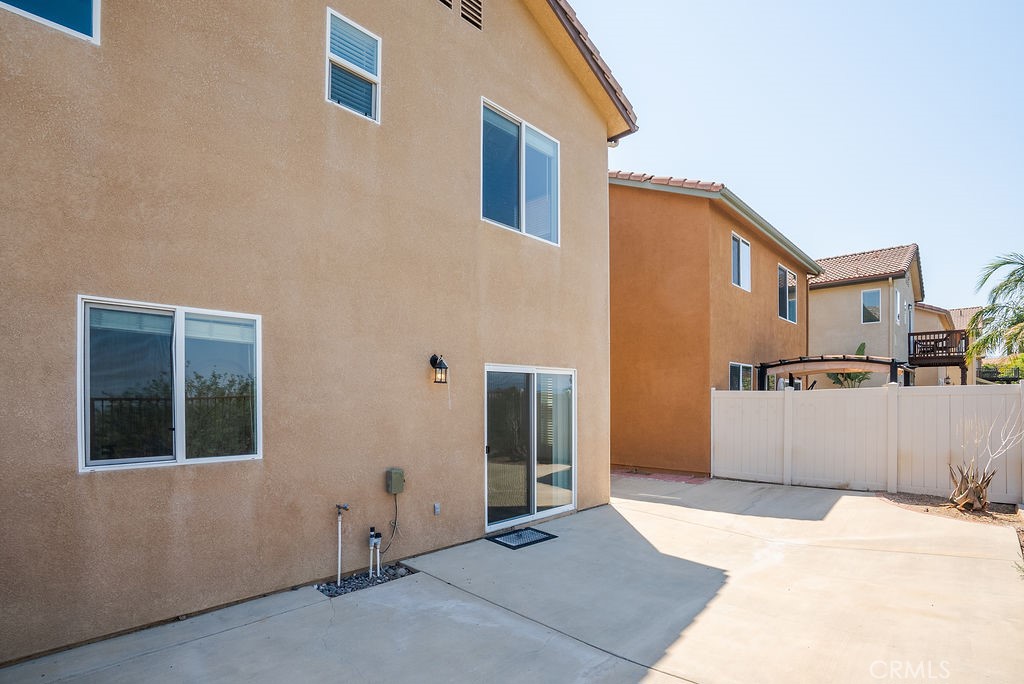 27635 Sienna Rdg Row Canyon Country, CA 91351 - Photo 29 of 30 a view of a house with a backyard