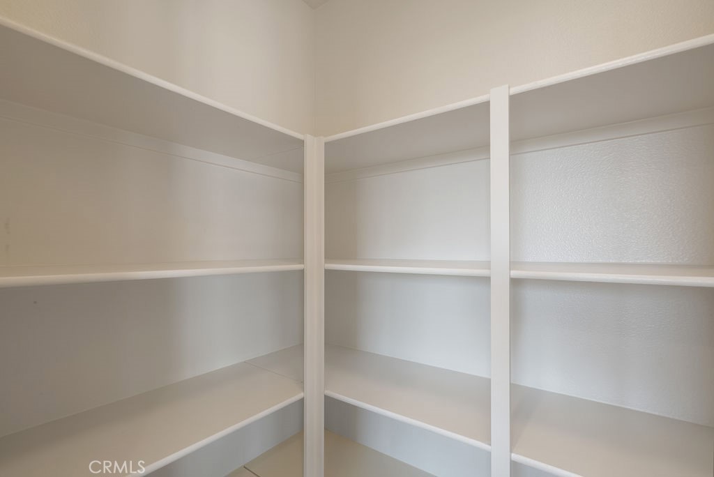 27635 Sienna Rdg Row Canyon Country, CA 91351 - Photo 9 of 30 a view of an empty walk in closet