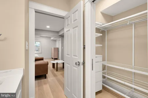 a en suite bathroom with a sink and a mirror