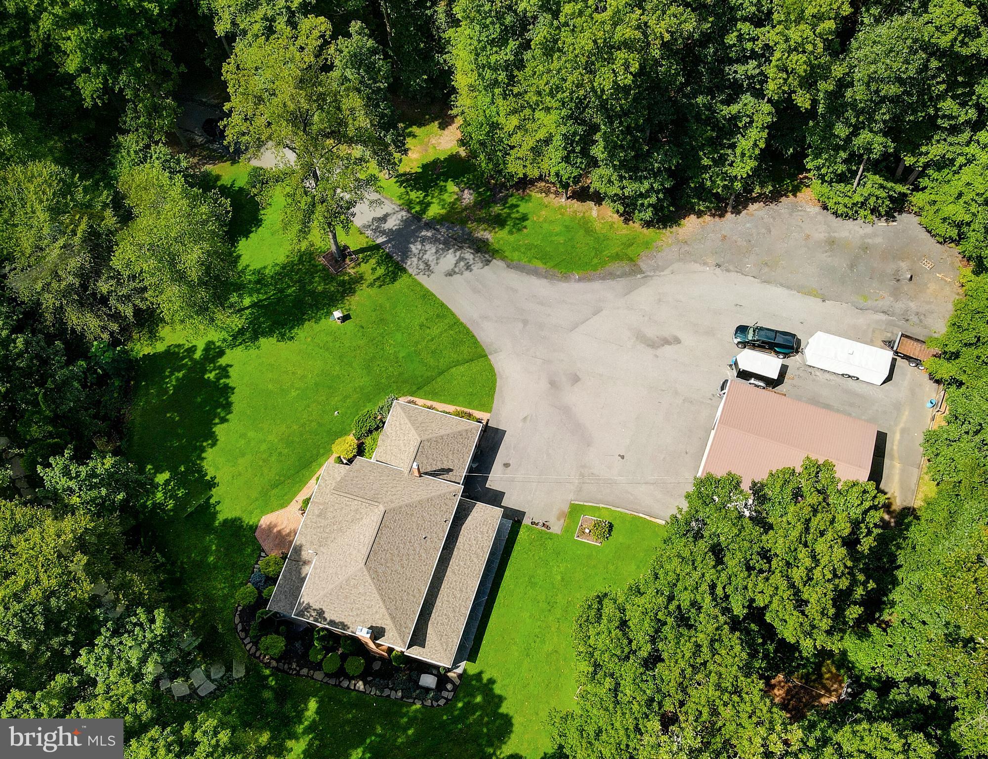 2021 Oakmont Road Fallston, MD 21047 - Photo 40 of 50 an aerial view of a house with a yard and lake view