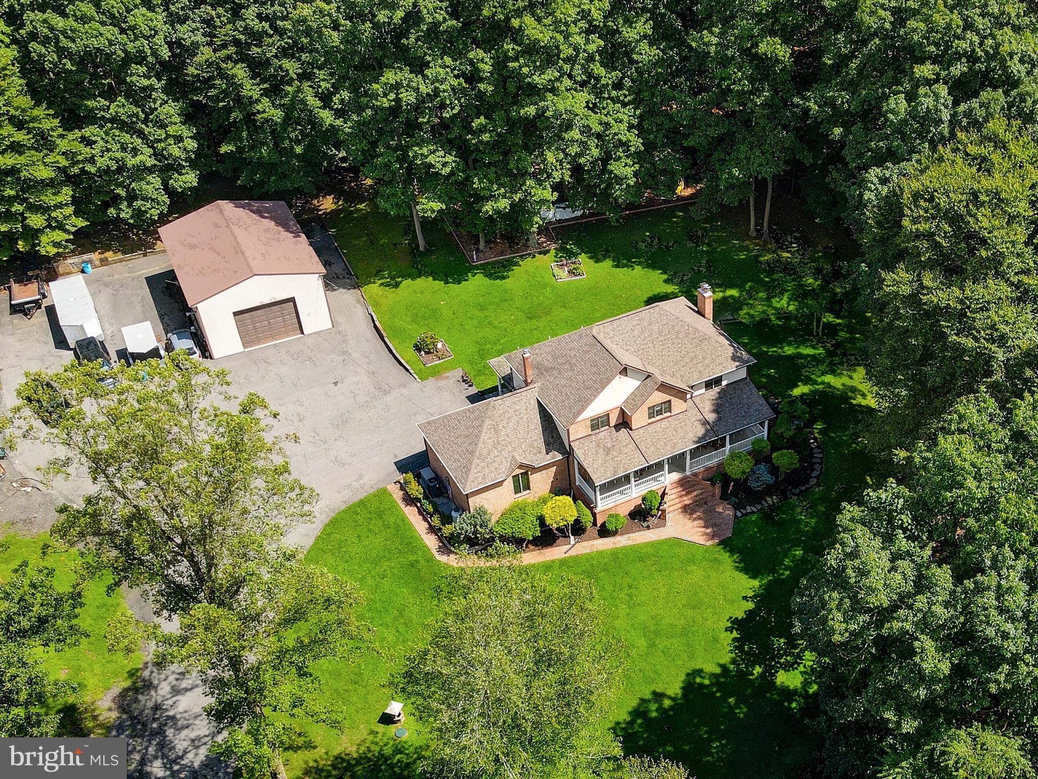 2021 Oakmont Road Fallston, MD 21047 - Photo 42 of 50 an aerial view of a house with garden space and street view