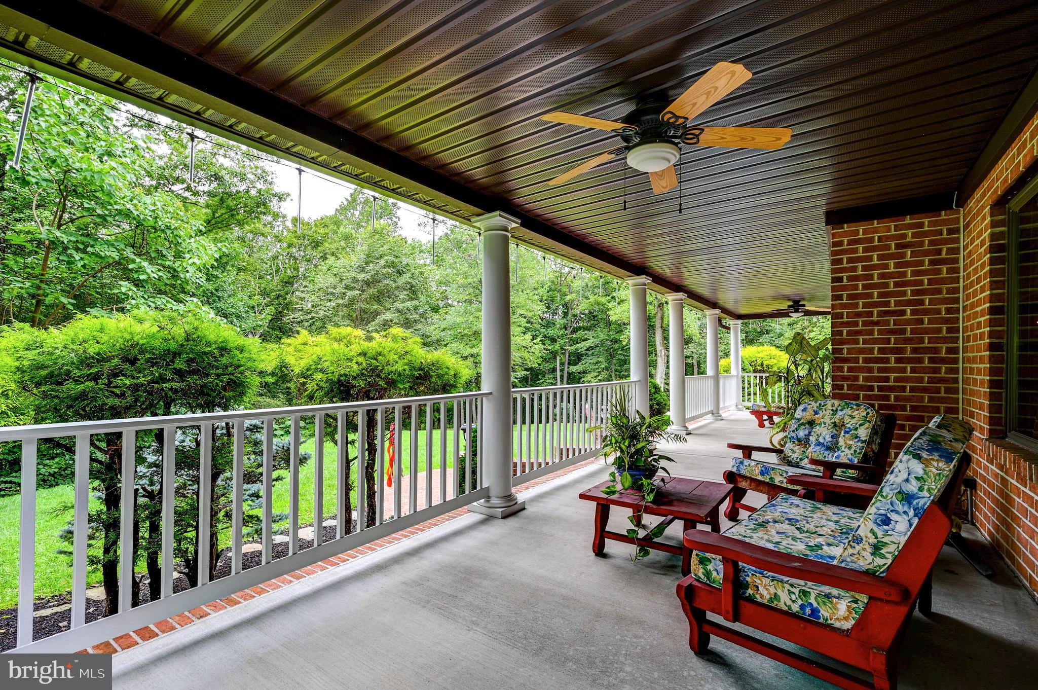 2021 Oakmont Road Fallston, MD 21047 - Photo 6 of 50 a balcony with furniture and a potted plant