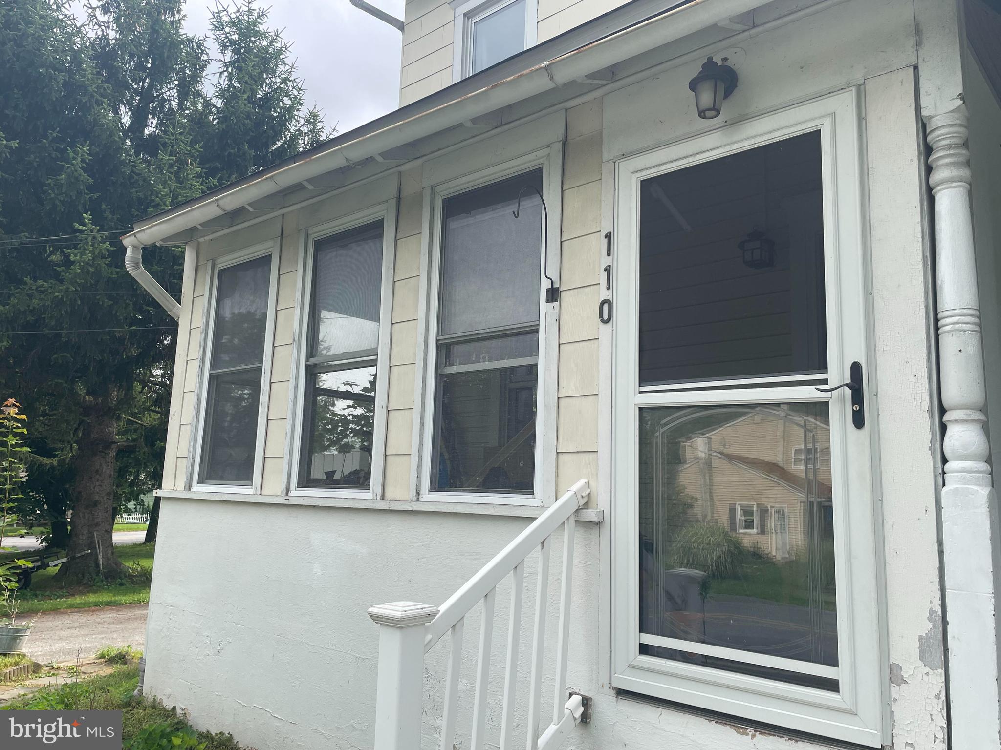 Front entrance to covered porch