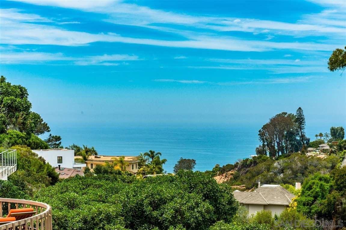 1402 Rodeo Drive La Jolla, CA 92037 - Photo 1 of 42 a view of a lake with a city