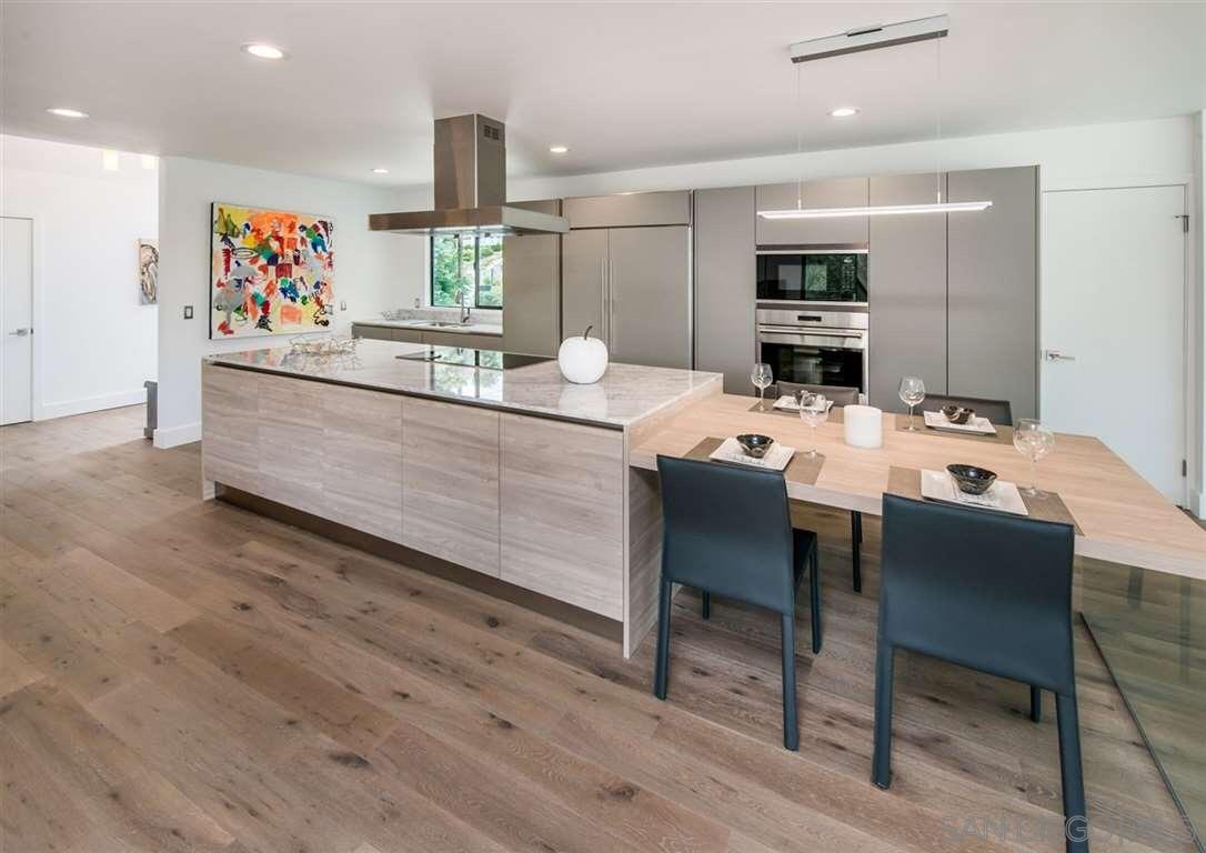 1402 Rodeo Drive La Jolla, CA 92037 - Photo 24 of 42 a view of a dining room with furniture