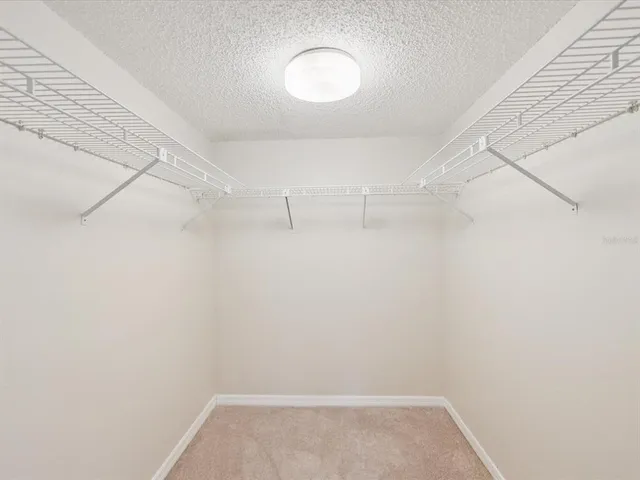 a view of a room with racks on the wall