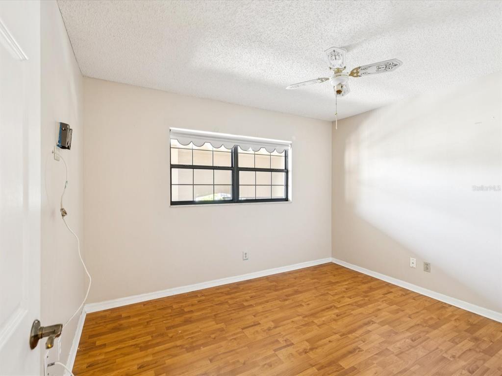 12900 Vonn Road, Unit E203 Largo, FL 33774 - Photo 8 of 26 a view of a room with a large window