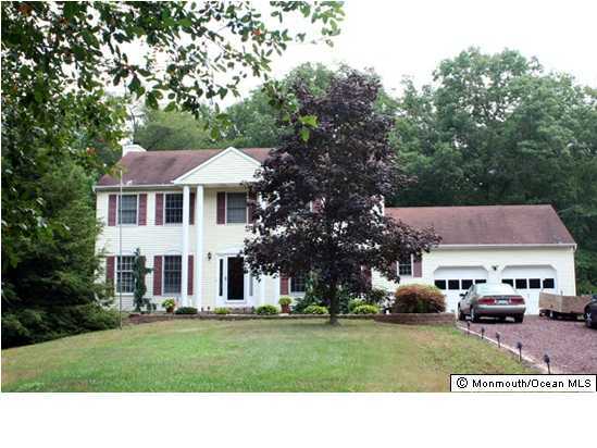 441 Freehold Road Jackson, NJ 08527 - Photo 2 of 3 a outdoor space with couple of cars parked in front of it