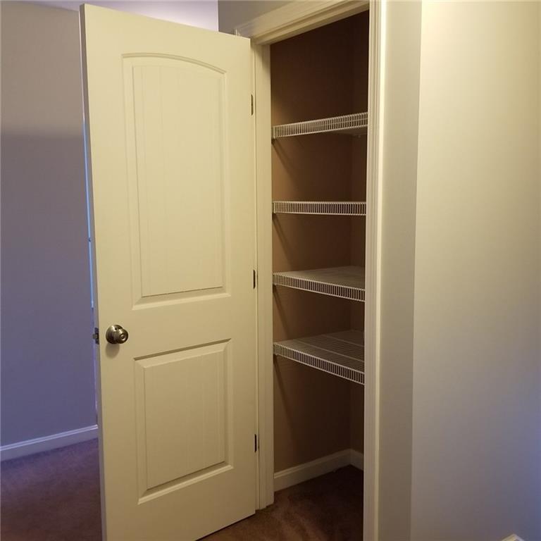 430 Back Road Shapleigh, ME 04076 - Photo 23 of 34 linen closet outside the bathroom