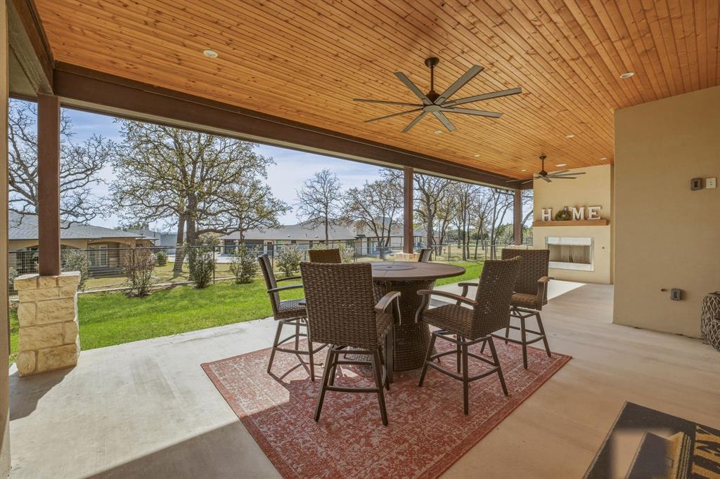 4009 Pinnacle Ridge Way Granbury, TX 76049 - Photo 28 of 35 Covered Patio with Wood Burning Patio