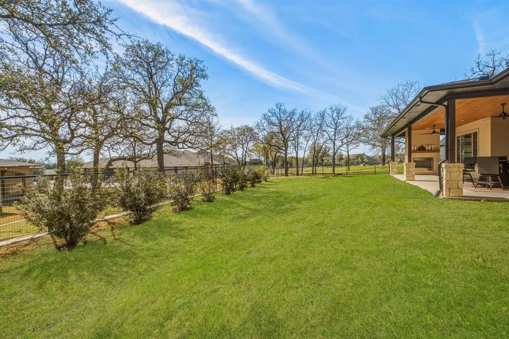 4009 Pinnacle Ridge Way Granbury, TX 76049 - Photo 32 of 35 Fenced Yard