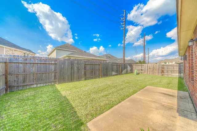 a view of a backyard with a trees