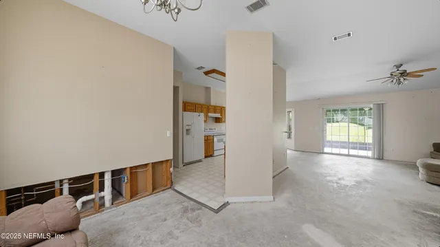 a view of livingroom with furniture and window