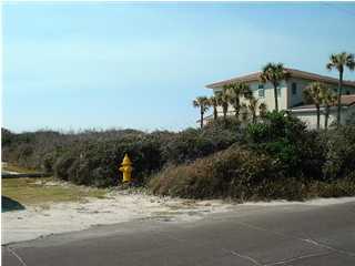 420 Blue Mountain Road Santa Rosa Beach, FL 32459 - Photo 5 of 6 a view of a road with a building in the background