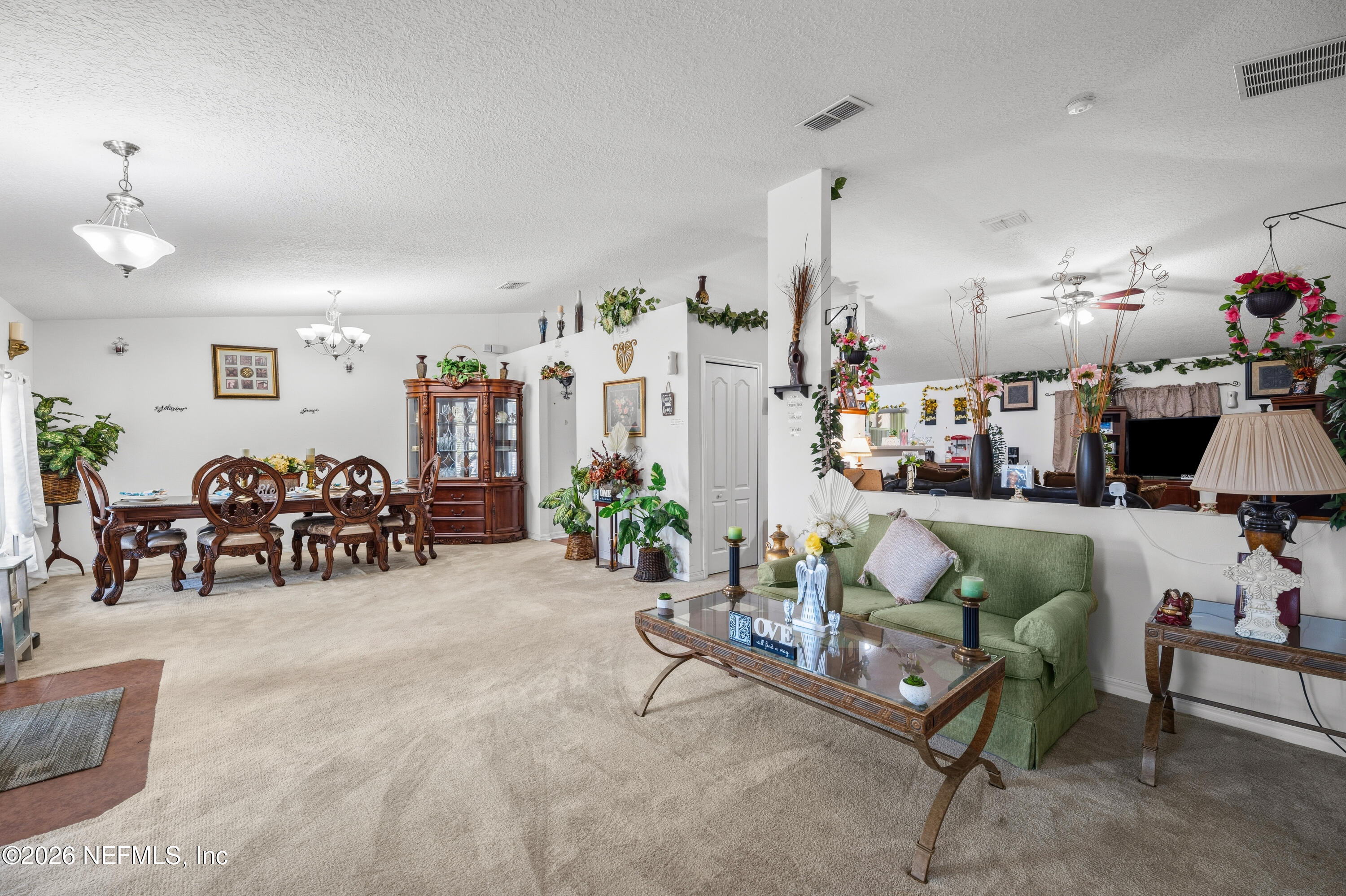 97106 Yorkshire Drive Yulee, FL 32097 - Photo 5 of 53 04 Sitting Room and Dining Room