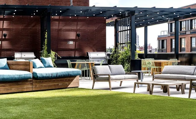 a outdoor living space with furniture and garden view