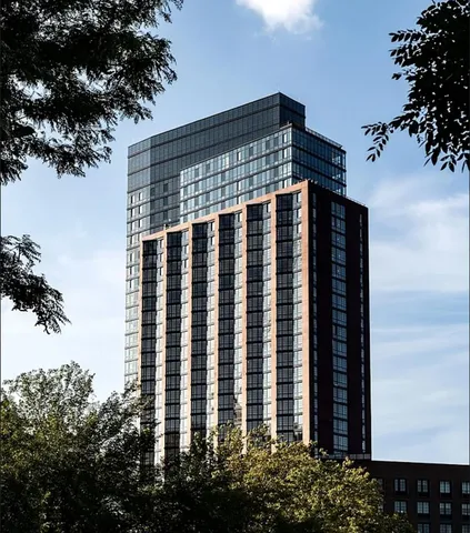 a view of a building from a backyard