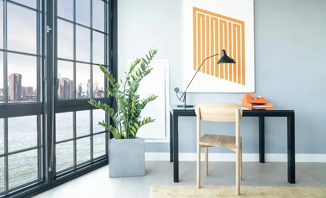 view of living room with furniture and floor to ceiling window
