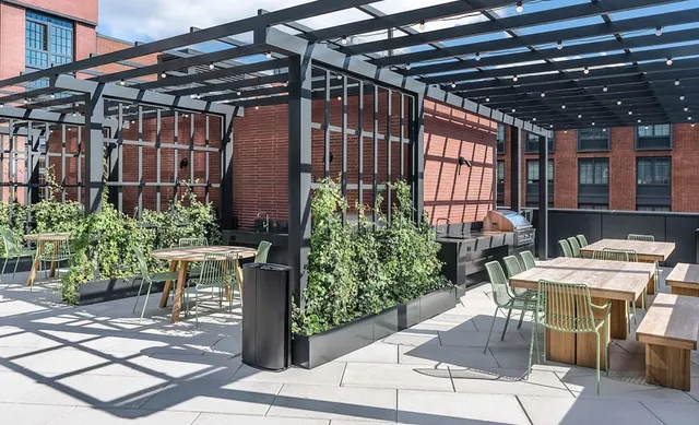 a view of a chairs and table in a patio