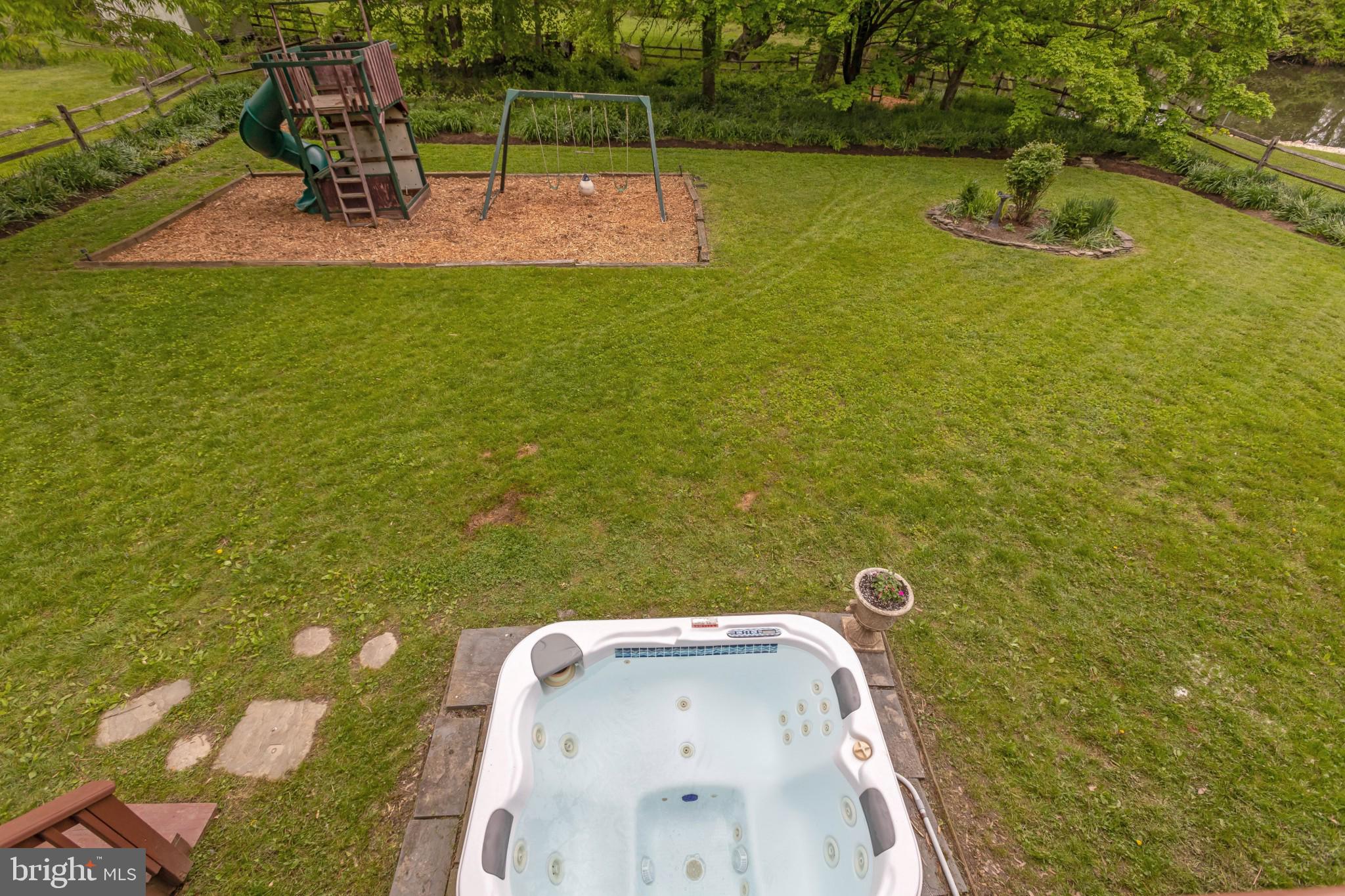 1921 Morningmist Drive Silver Spring, MD 20906 - Photo 14 of 38 Hot tub and back yard from the deck