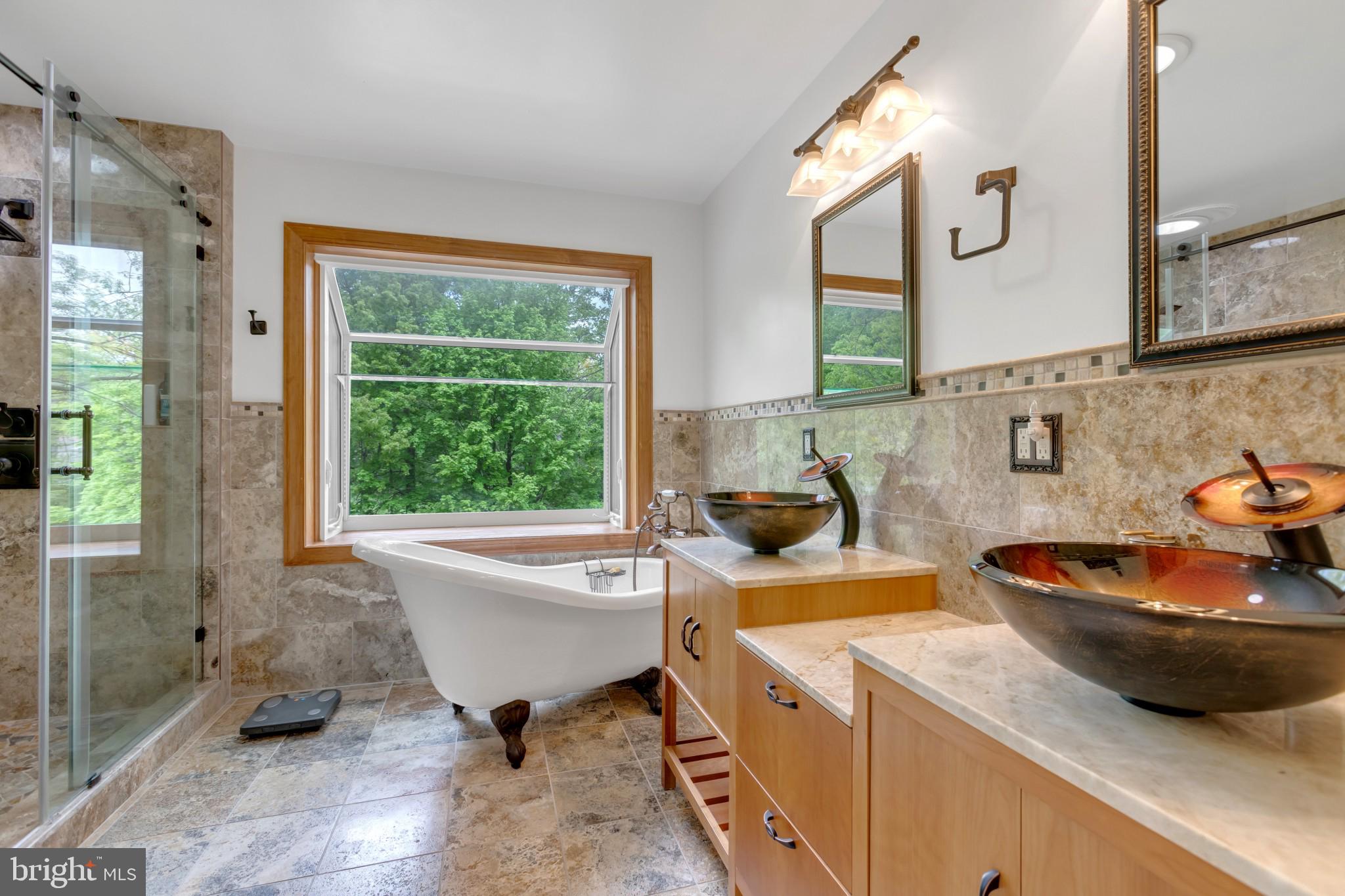 1921 Morningmist Drive Silver Spring, MD 20906 - Photo 19 of 38 Soaking tub sited for views of the pond