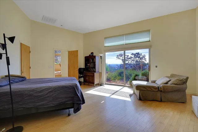 a bathroom with a sink vanity and a mirror