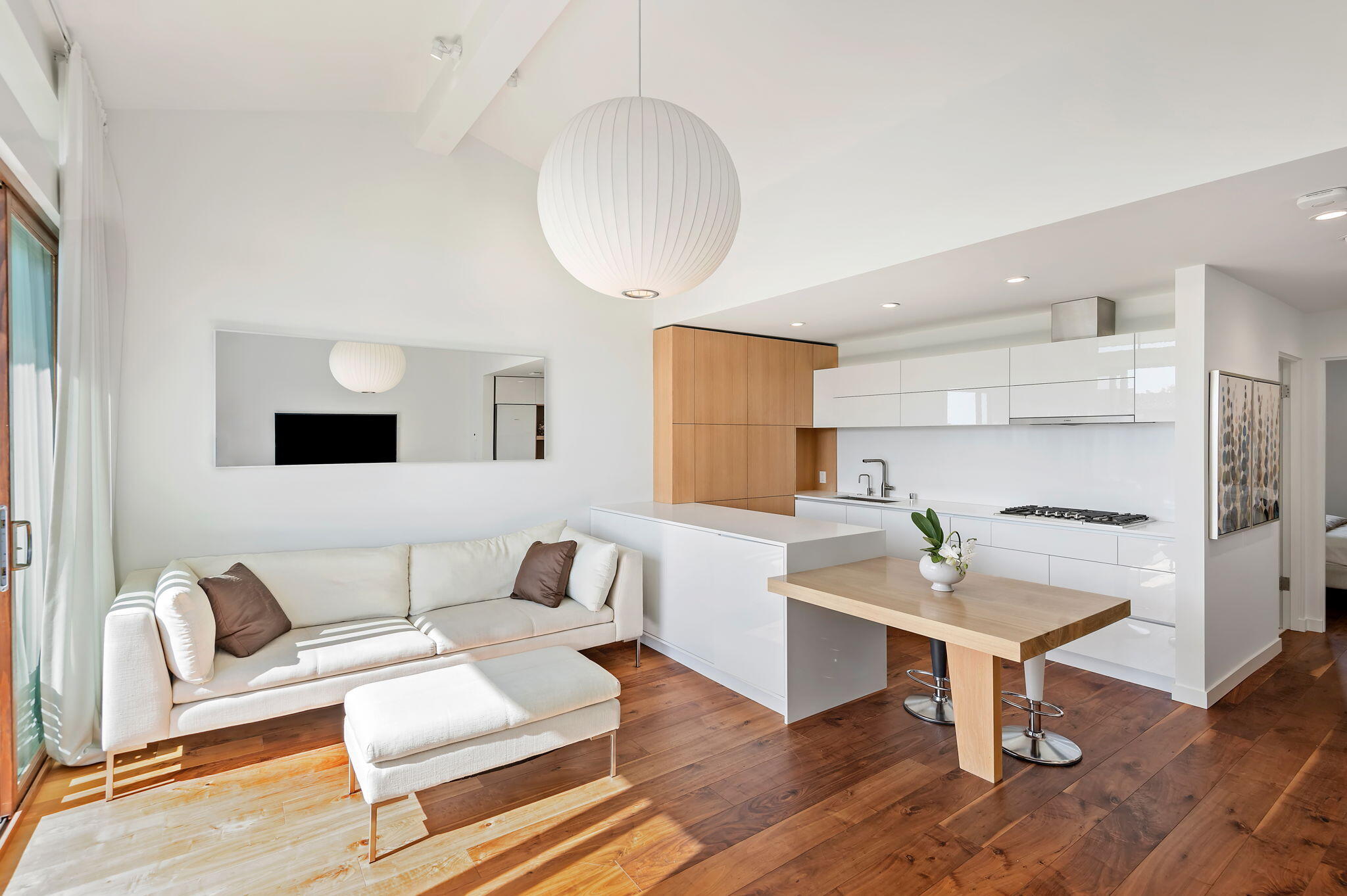 3375 Foothill Road, Unit 233 Carpinteria, CA 93013 - Photo 13 of 13 a living room with furniture and a wooden floor
