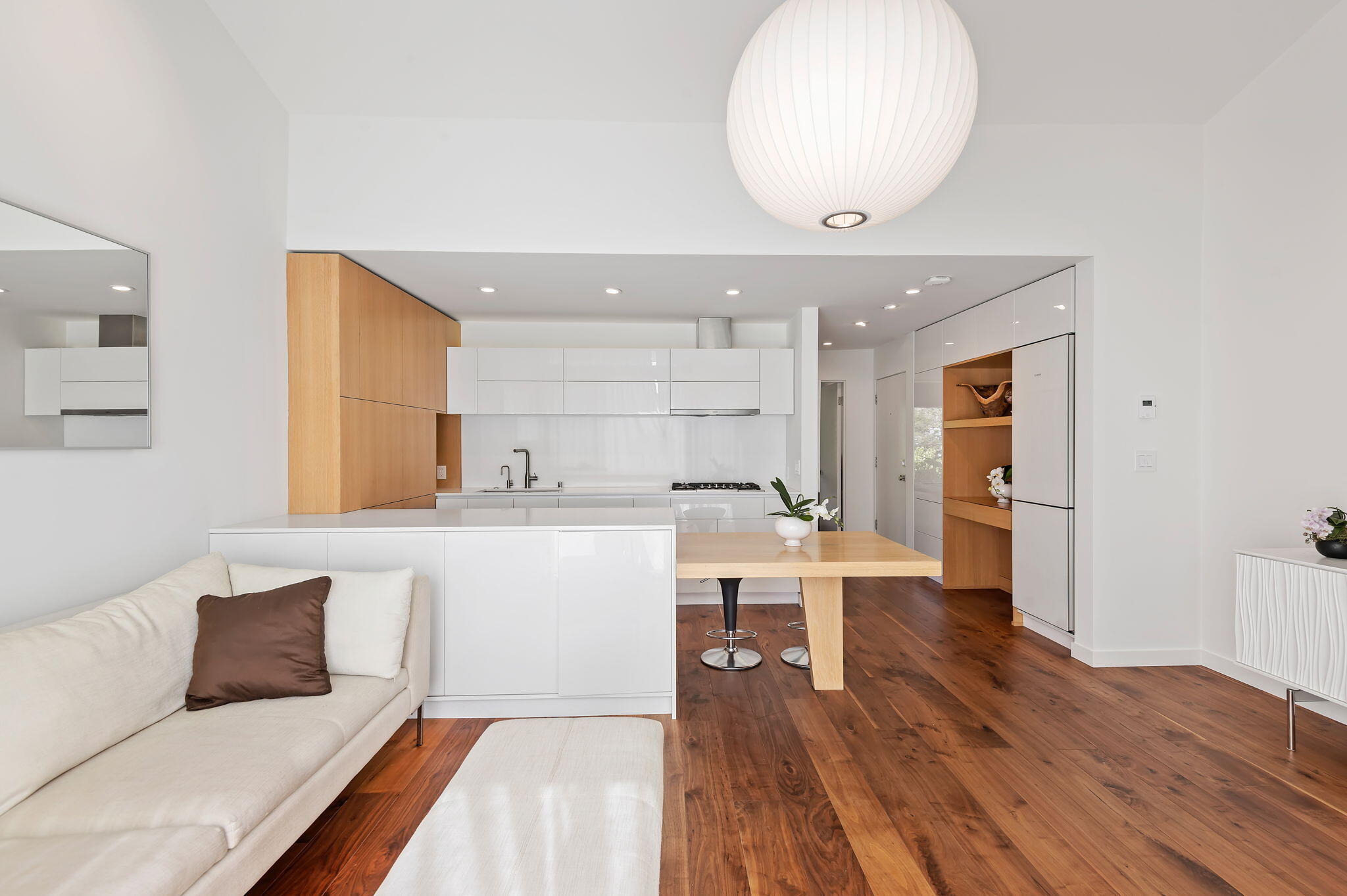 3375 Foothill Road, Unit 233 Carpinteria, CA 93013 - Photo 2 of 13 a living room with furniture and wooden floor