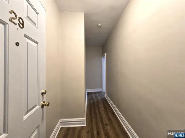 a bathroom with a sink a toilet and bathtub