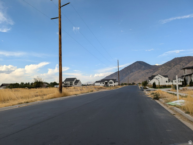 209 North 800 West Mapleton, UT 84664 - Photo 3 of 4 Paved street with mountain backdrop and partially developed properties