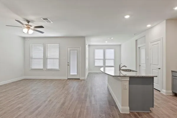 a view of kitchen and windows